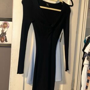 Size small black long sleeve body con sweater dress NWT never worn
